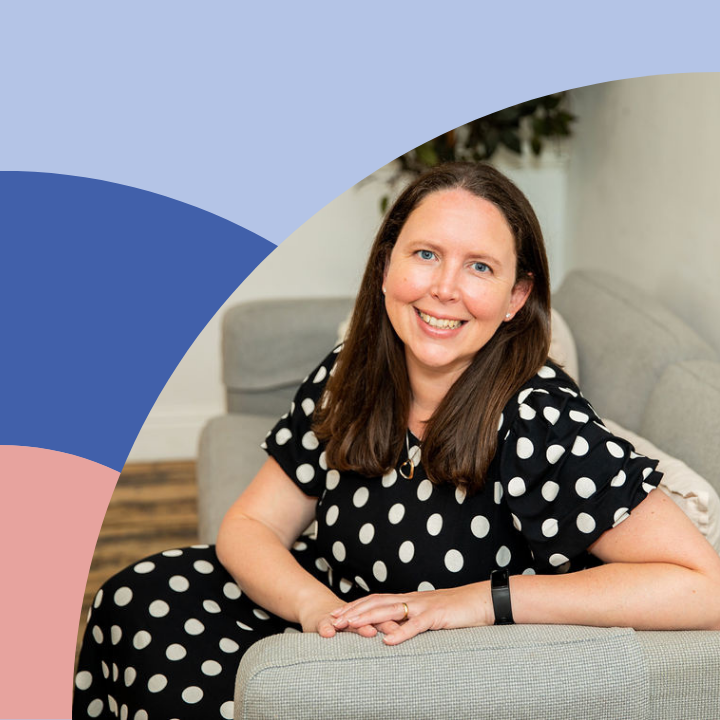 Jo Miller from Teams Reconnected leans against a brick wall with her hand in her knee wondering how she can help resolve team conflict using workplace mediation and team coaching.